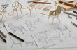 © Chaosamran_Studio - Designer sketching drawing design development product plan draft chair armchair Wingback Interior furniture prototype manufacturing production. designer studio concept .