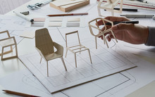 Designer Sketching Drawing Design Development Product Plan Draft Chair Armchair Wingback Interior Furniture Prototype Manufacturing Production. Designer Studio Concept .
