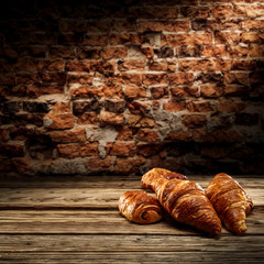 Wall Mural - Fresh cakes on desk and wall with shadows. 