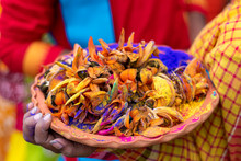 Bright Organic Colours And Flowers In A Clay Plate For Indian Holi Festival. Colourful Gulal (powder Colors) For Happy Holi. (Selective Focus)