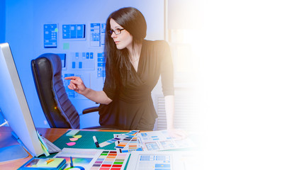 Poster - designer's office. girl creates application design on paper. woman chooses a color for the applicati