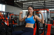© chayathon2000 - Asian woman in fitness gym