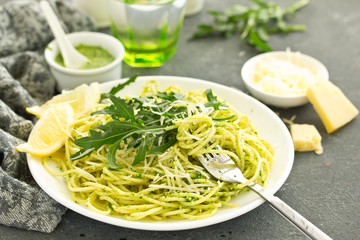 Wall Mural - Spaghetti with arugula pesto. Selective focus.