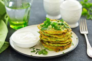 Wall Mural - Fritters from zucchini and greens. Selective focus