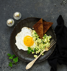 Wall Mural - Fried egg with avocado and cottage cheese salad. . Healthy breakfast. Selective focus