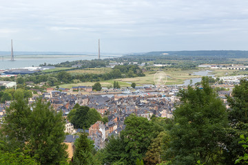 Wall Mural - honfleur, france. view of the city and the bridge over the river seine