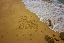 Sean Birthday Sign On The Golden Sands By Coast In Thailand