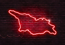 Neon Sign On A Brick Wall In The Shape Of Georgia.(illustration Series)