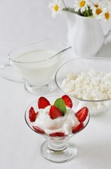 Sticker - cheese cream. whipped curd cream with strawberries. Homemade cottage cheese is whipped with cream. Chamomile flowers. A useful dessert. On a light background.