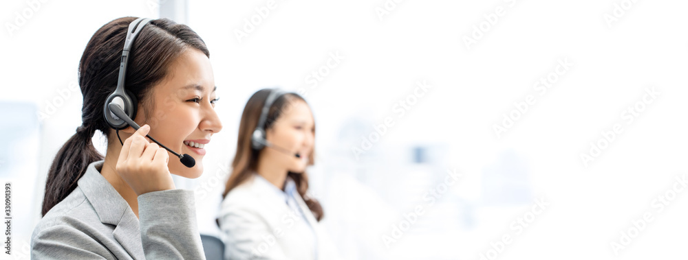 Banner of smiling telemarketing Asian woman working in call center office - obrazy, fototapety, plakaty 