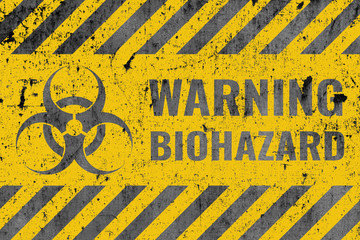 bio hazard sign warning message on rust steel wall