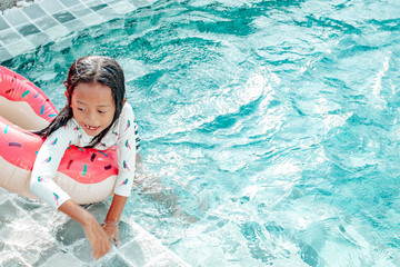 Holiday, vacation concept, Children swimming in the pool are very fun.