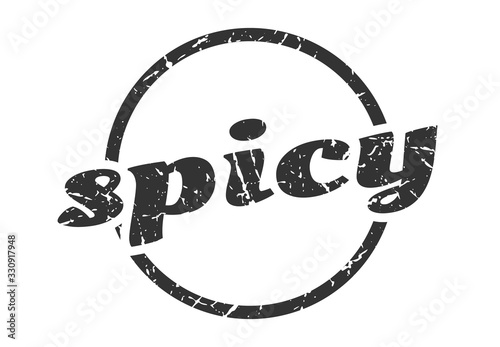 Fotografía spicy sign. spicy round vintage grunge stamp. spicy