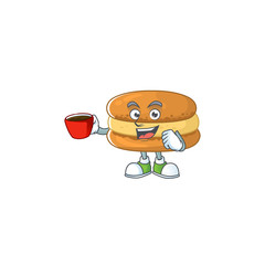 Sticker - Chocolate macarons mascot design style showing an Okay gesture