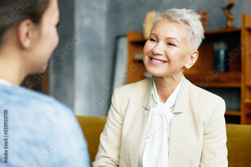 Cuadros en Lienzo Picture of elegant sixty year old female psychological counselor with stylish ha