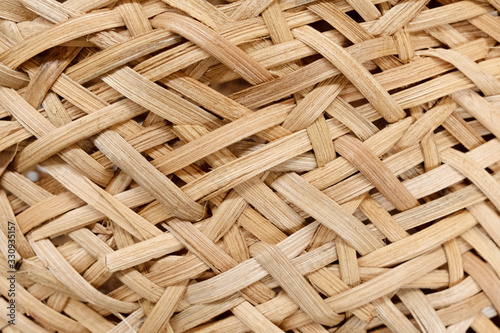 Fotomural Closeup texture of wicker basket in beige color