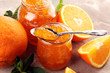 orange homemade jam marmelade in a glass jar. orange marmelade
