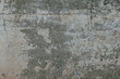 © Nichita - old concrete wall with dirty scuffs background texture