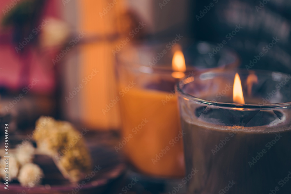 Scented Candles, Presents, Dried Flowers and Leaf Decoration on a Table - obrazy, fototapety, plakaty 