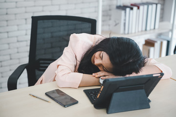 woman employee napping on desk