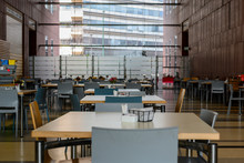 Empty Cafeteria Or Cafe Or Food Area In A Large Indoor Shopping Mall. No People. Horizontal View. Side View.