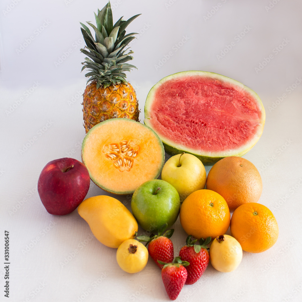 Foto de Stock Diferentes frutas como piña, melon, sandía, manzanas ...