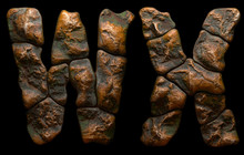 Set Of Rocky Letters W, X. Font Of Stone On Black Background. 3d