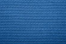 Background Texture Of Blue Knitted Wool Fabric