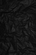 black wrinkled paper texture, embossed background