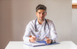 © GENETTICA - Doctor talking to the camera. Expert advice concept.
