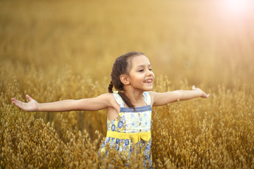 Sticker - Portrait of cute girl in wheat field