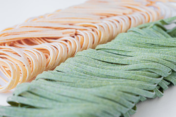 green and yellow healthy egg noodles close-up