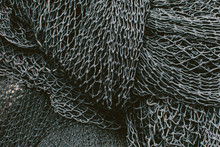Pile Of Commercial Fishing Nets And Gill Nets On A Fishing Quay.,Seattle
