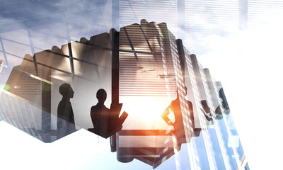 Wall Mural - Group of business people outlines with lit background