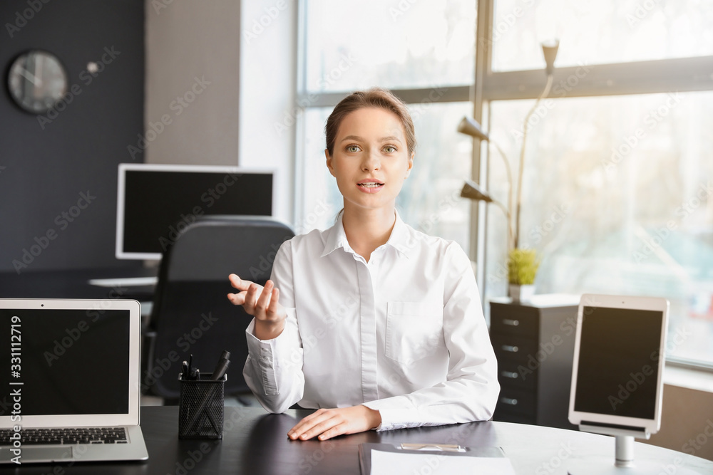 Young woman during job interview in office