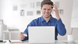 © stockbakers - Online Payment Failure for Handsome Casual Young Man