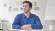 © stockbakers - Thinking Positive Casual Adult Man Brainstorming at Work