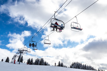 Wall Mural - View of the chairlifts of the Morzine ski slopes in the French Alps during winter