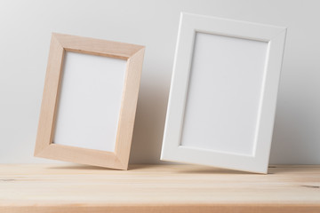 vertical white wood photo on floor with white wall