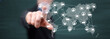 © thodonal - Man touching a global network technology concept