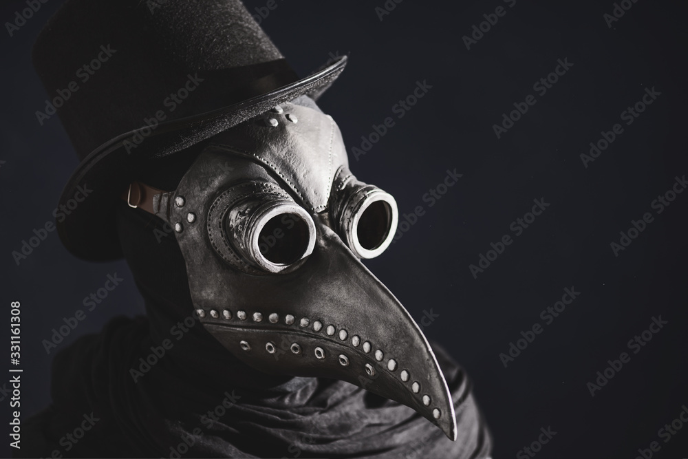 Masked man plague doctor, head profile, with bird mask and hat. Vintage ...