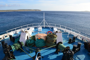 Wall Mural - Bows of a ferry in Malta looking across at Comino.