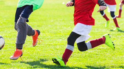 Wall Mural - Boys play soccer sports field