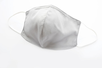 Face mask, cloth for protection against viruses and dust on a white background