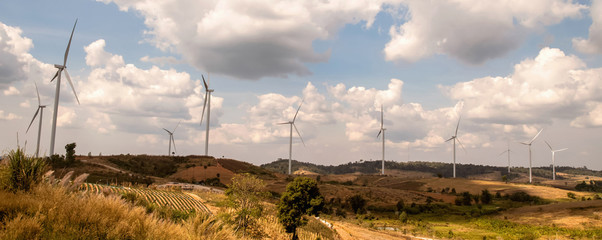 Wall Mural - wind turbine on hill. concept clean energy