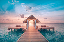 Amazing Sunset Landscape. Picturesque Summer Sunset In Maldives. Luxury Resort Villas Seascape With Soft Led Lights Under Colorful Sky. Dream Sunset Over Tropical Sea, Fantastic Nature Scenery