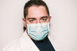 © REFLEJAARTE  - Medical stock photography wearing blue mask and white coat with green eyes.