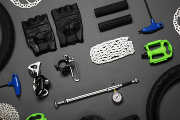 Sticker - Set of different bicycle tools and parts on grey background, flat lay