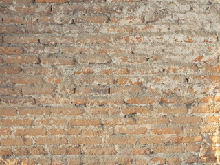 Texture of old brick wall with scratches,cracks and stains as a retro pattern wall.Concept is conceptual or wall banner,decorate,abstract background,material,construction