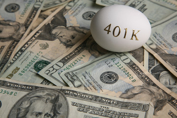 Money and nest eggs concept for retirement, savings, and financial planning